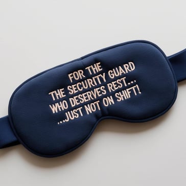 sleeping mask that says “For the security guard who deserves rest... just not on shift!” (1)